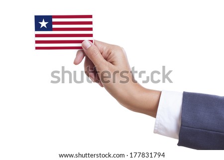 Businessman holding a business card with Liberia Flag 