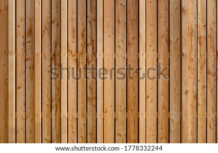 Cladding wood with various boards as wooden facade