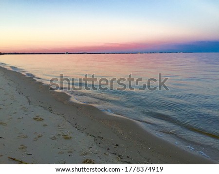 pastel sunset on beach in summer 