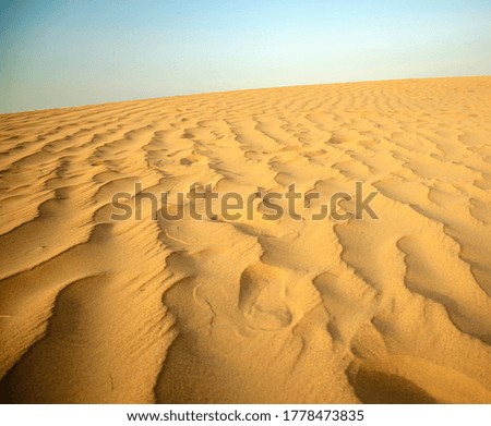 Shot of a sand dunes at evening hour