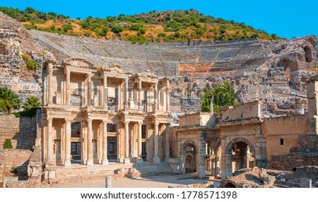 Celsus Library in Ephesus with Amphitheater in Ephesus in the background  (Efes) - Selcuk, Turkey