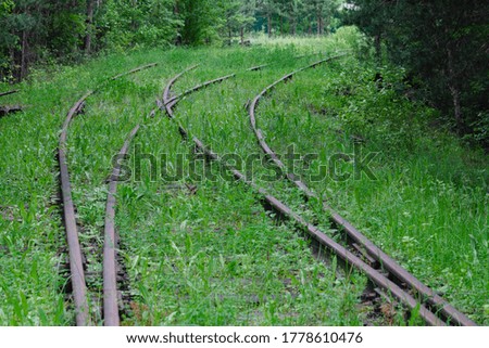 Railroad for a train in the grass. abandoned railway
