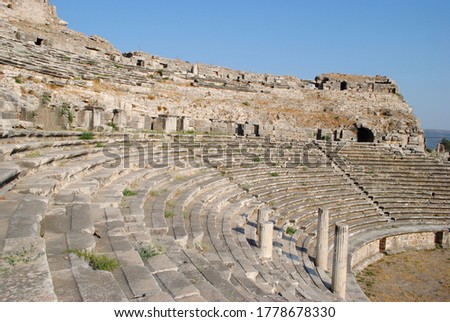 A Hellenistic tiered seating amphitheater dating back to 500 BC with the nature's beautiful Patina. Miletus Ruins Turkey.