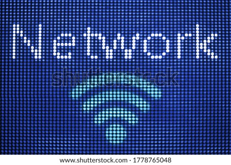 Wireless network icon on blue LED screen