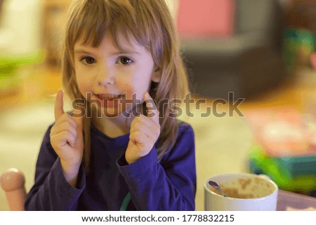 portrait of a child in home, note shallow depth of field