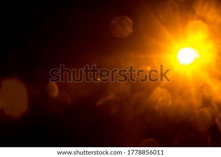 Abstract Natural Sun flare on the black.