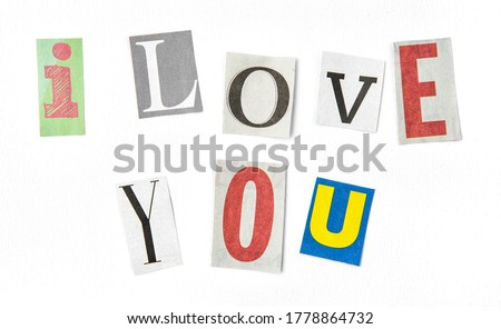 I love you. Paper cut letters. Newspaper magazine uppercase cutouts