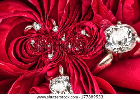 Random pattern made out of diamond and roses with a red background