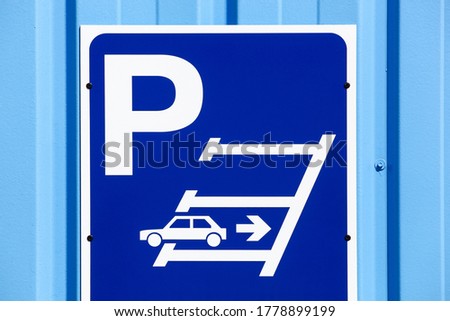 Reverse parking only sign on a wall