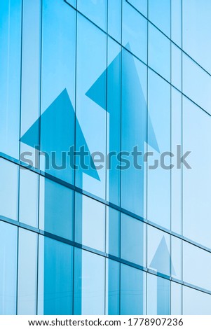 The concept of business growth and personal success. Shooters on the facade of the building Royalty-Free Stock Photo #1778907236