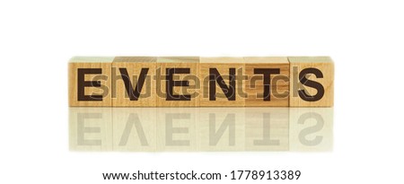 Event word written on wood block. Event text on wooden table for your desing, concept, white background.