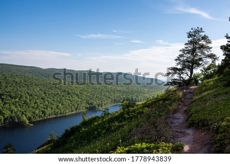 A landscape of the Porcupine Mountains Wilderness State Park under the sunlight in Michigan, the US