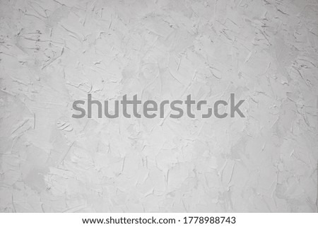 Textured background covered with decorative plaster
