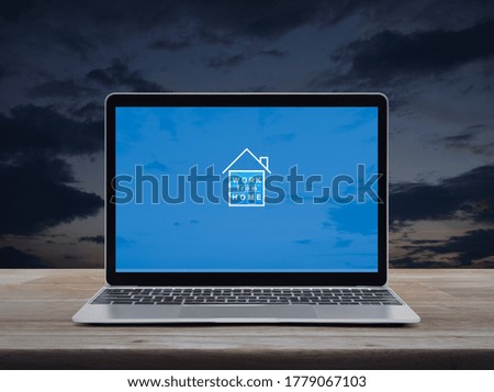 Work from home flat icon with modern laptop computer on wooden table over sunset sky, Business social distancing online concept