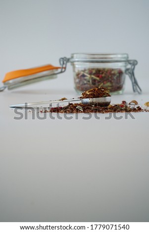 A shallow focus shot of Rooibos tea isolated on a white background