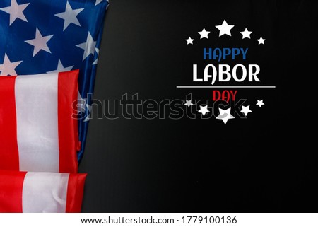 Happy Labor day banner, USA flag on dark background.
