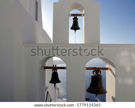 Typical urban landscape with a view of the church and the historical part of the town of Fira Santorini island, Greece.