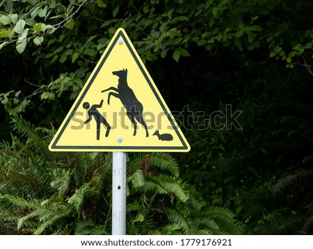 Warning sign to not approach the elk. 