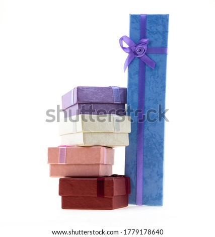 stack of giftbox square red, pink and long gift blue on an isolated background