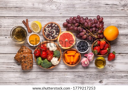 Foods that could lower risk of cancer, top view Royalty-Free Stock Photo #1779217253