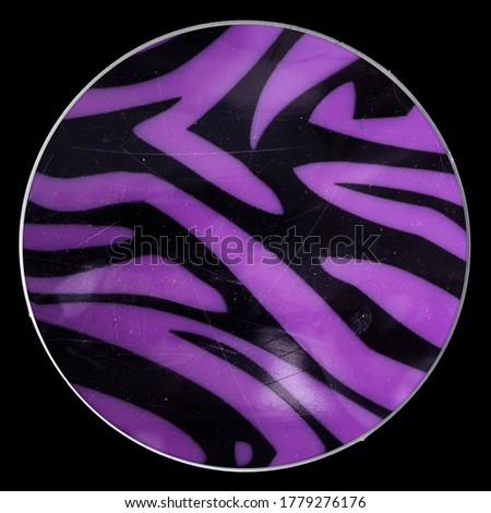 cool scratched purple vinyl sticker with nice texture on paper sheet isolated on black background.