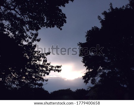 Shadowy sunset after a storm Royalty-Free Stock Photo #1779400658