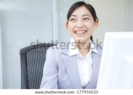 Japanese businesswoman laughing