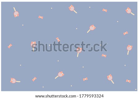 cute pink lollipop and bow pattern with blue background