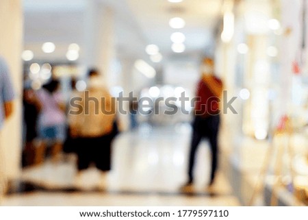 The background of the mall is blurred