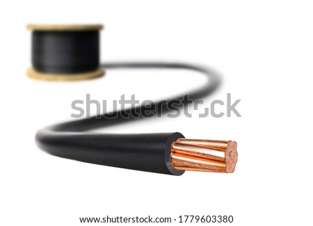Electric cable on white background. Copper wire is the electric conductor of urban society. Royalty-Free Stock Photo #1779603380