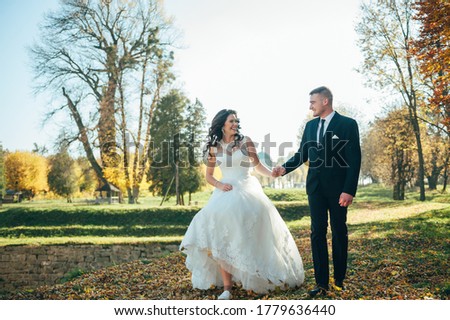 Bride and groom at a photo session in the nature