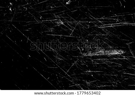 white scratches with scuffs on a black background. template for design Royalty-Free Stock Photo #1779653402