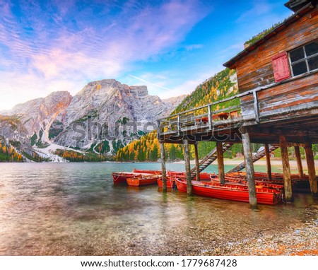 Fantastic scenery of famous alpine lake Braies at autumn. Location:  national park Fanes-Sennes-Braies, region Trentino-Alto Adige , province Bolzano, Italy, Europe