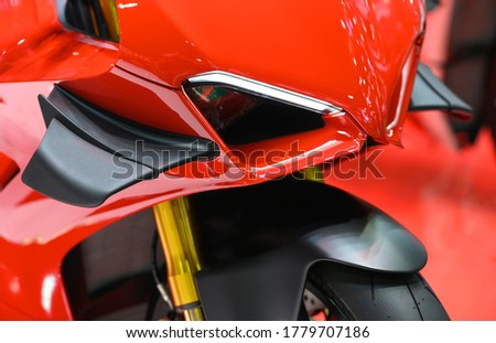 Close-up of front winglet air deflector on motorbike. Royalty-Free Stock Photo #1779707186