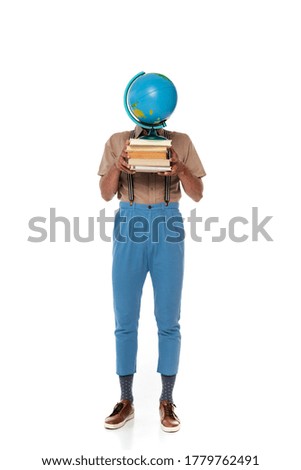 Nerd in suspenders holding globe and books near face on white background