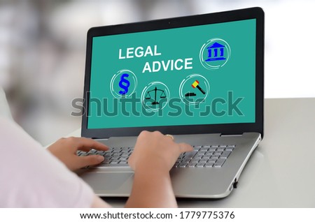 Woman using a laptop with legal advice concept on the screen