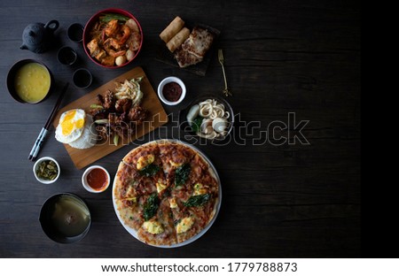 Chinese Meal At Home. Asian Food Flatlay on Wooden Table with Copy Space. Quarantine Meal at home. Dark Food Photography.