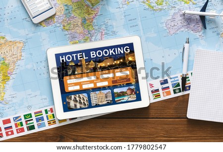 Hotel Booking Background. Digital Tablet With Application For Travel Accommodation Search Lying On Desk With Travel Map. Collage, Above View