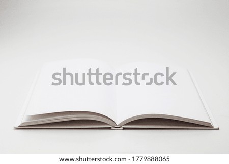 White open book on white

