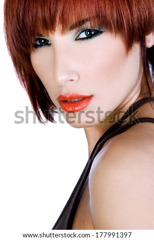 Portrait of a beautiful red-haired girl 