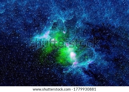 A beautiful green galaxy in deep space. Elements of this image were furnished by NASA.