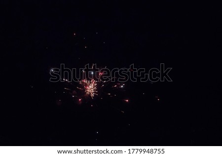 Festive fireworks against the black sky