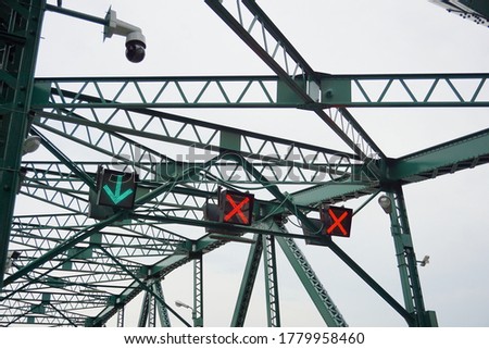 Traffic lights on the Green Bridge, Bangkok, Thailand