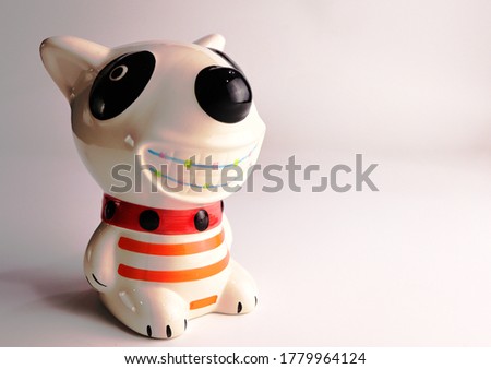 Dog dolls made of ceramic on white background