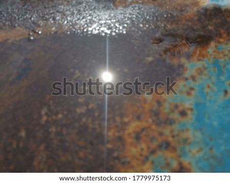 Blurred background with reflected sunlight