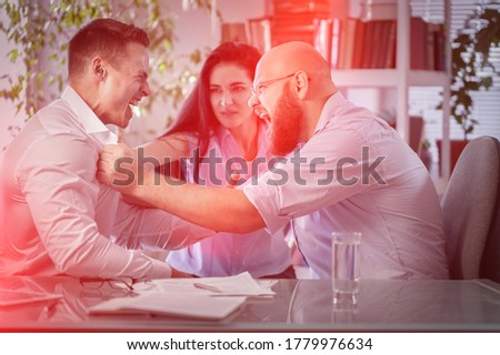 Conflict couple of angry men in office. Royalty-Free Stock Photo #1779976634