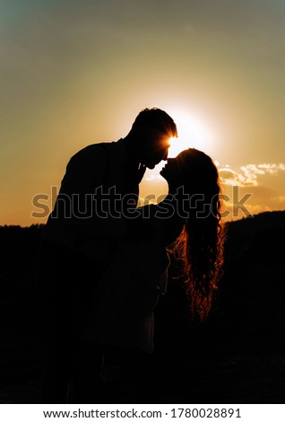 Silhouette Of Two People Holding Hands And Kissing Background Shadow Of Two Adult Girl And Boy Holding Hands At Sunset Light Stock Photos And Images Avopix Com