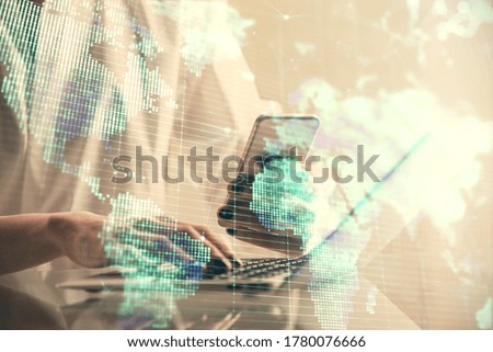 Double exposure of business theme sketch hologram and woman holding and using a mobile device.