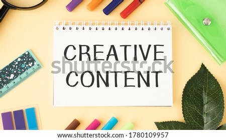 Text sign showing Creative Content. Conceptual photo providing showing with the type of content they re craving Papercraft craft paper desk square spiral notebook office study supplies.
