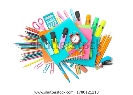 Pile of school supplies isolated on white background